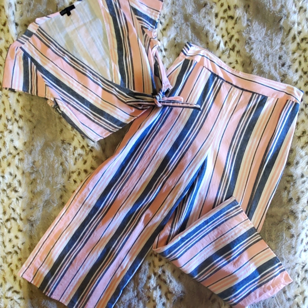 Two piece. Crop/wrap top. High Waisted pants